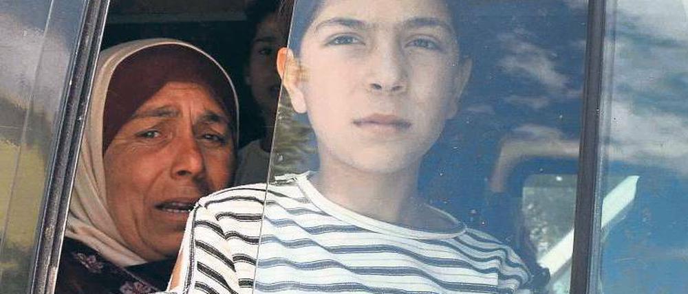 Auf der Flucht. Syrer erreichen im Bus die türkische Stadt Hatay. Foto: dpa