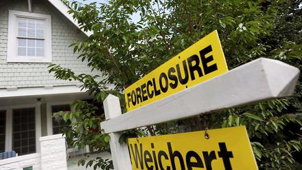 Insolvenzware. Banken kauften in den USA faule Immobilienkredite auf, etwa für dieses Haus in Virginia, und etikettierten diese um zu Papieren mit bester Bonität. Das löste schließlich die Finanzkrise aus – die Weltwirtschaft leidet bis heute unter den Folgen. 