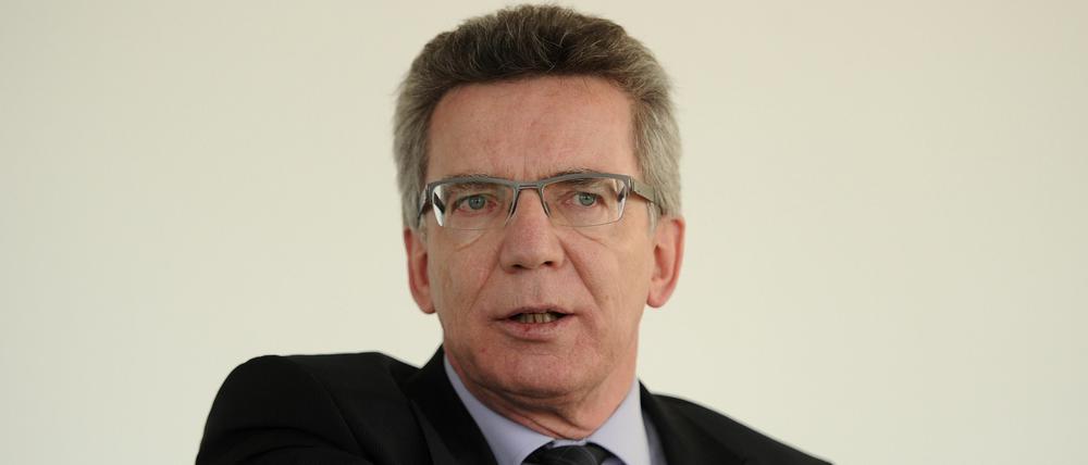 Thomas de Maizière: "Wir lassen Afghanistan nicht allein".