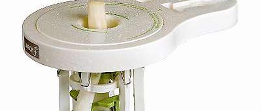 Spargelschälmaschine.