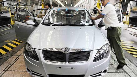 Made in China. Nicht nur einheimische Hersteller sind für das enorme Produktionsplus in den vergangenen Jahren verantwortlich. Auch Amerikaner und Europäer fertigen direkt im Land für den wichtigen Wachstumsmarkt.