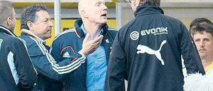 Klopp (rechts) und Sammer. Foto: AFP