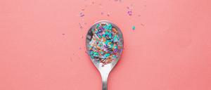 Environmental pollution and water microplastic. Micro plastic with spoon.