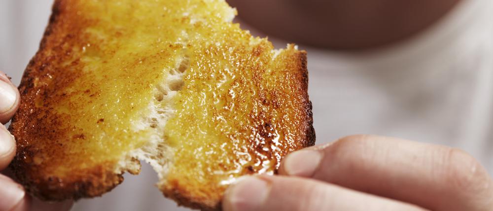 Man breaking bread 