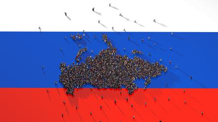 Large group of people forming Russia map on Russian Flag