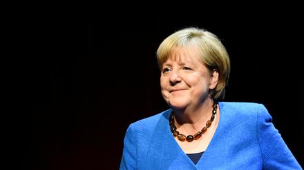 Former German Chancellor Angela Merkel attends a talk about "the challenging issues of our time" with author Alexander Osang at the Berliner Ensemble theatre in Berlin, Germany June 7, 2022. REUTERS/Annegret Hilse