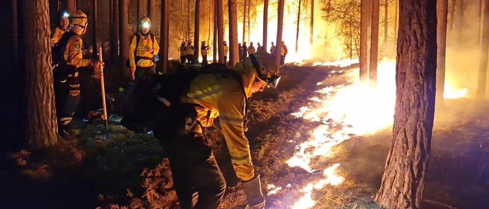 Einsatzkräfte der Hilfsorganisation @fire bei Beelitz, 19. Juni 2022.
