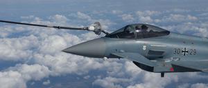 A Eurofighter Typhoon EF2000 of the German Air Force is refuelled by an Airbus A330 MRTT "Phenix" in the airspace of Poland as part of NATO's enhanced Air Policing (eAP) to secure the skies over Baltic allies, March 29, 2022. REUTERS/Benoit Tessier - RC29CT9JMY2E