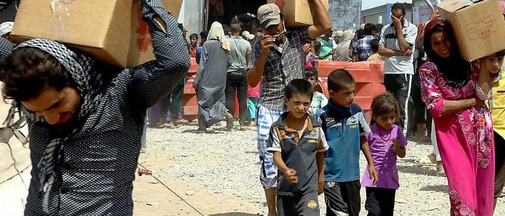 Im Irak fliehen immer mehr Menschen vom Terror der IS. Zum Beispiel ins Flüchtlingscamp Khazir nahe Erbil. 