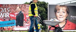 Bald wieder ein Koalitionspaar? Bundeskanzlerin Angela Merkel und Kanzlerkandidat Peer Steinbrück auf Plakaten ihrer Parteien. Foto: dpa