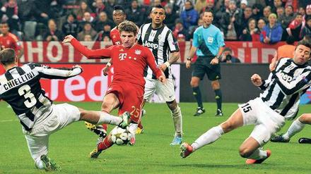 Schöne Erinnerungen. Im Frühling 2013 warfen Müllers Bayern Juventus im Viertelfinale raus – und gewannen später die Champions League. Foto: p-a/dpa/Leonhardt