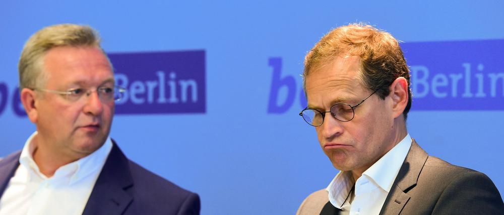 Berlins Regierender Bürgermeister Michael Müller (rechts, SPD) und Innensenator Frank Henkel (CDU). 