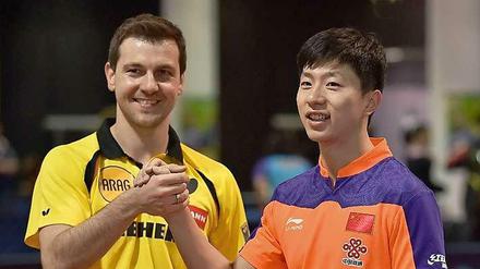 Harmonisches Miteinander. Timo Boll und Ma Long wollen den Titel im Doppel. 