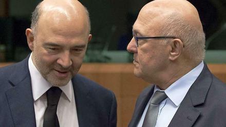 Auf Kompromisssuche. EU-Währungskommissar Pierre Moscovici (links) und Frankreichs Finanzminister Michel Sapin.