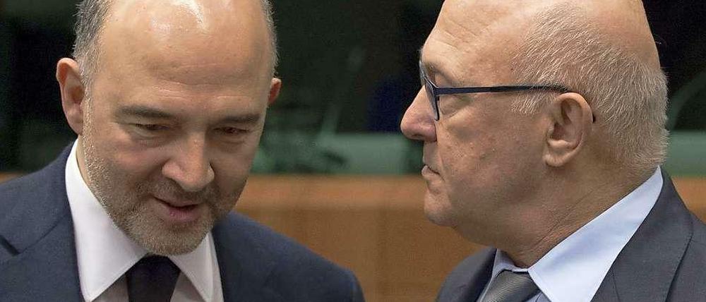 Auf Kompromisssuche. EU-Währungskommissar Pierre Moscovici (links) und Frankreichs Finanzminister Michel Sapin.