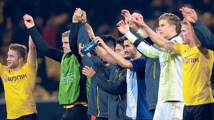 Gruppensieger. Dortmunds Spieler konnten sich über das 1:1 in der Champions League gegen Anderlecht nur bedingt freuen. Wichtiger ist derzeit die Bundesliga. 