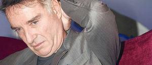 Der Unternehmer mit gesenktem Blick