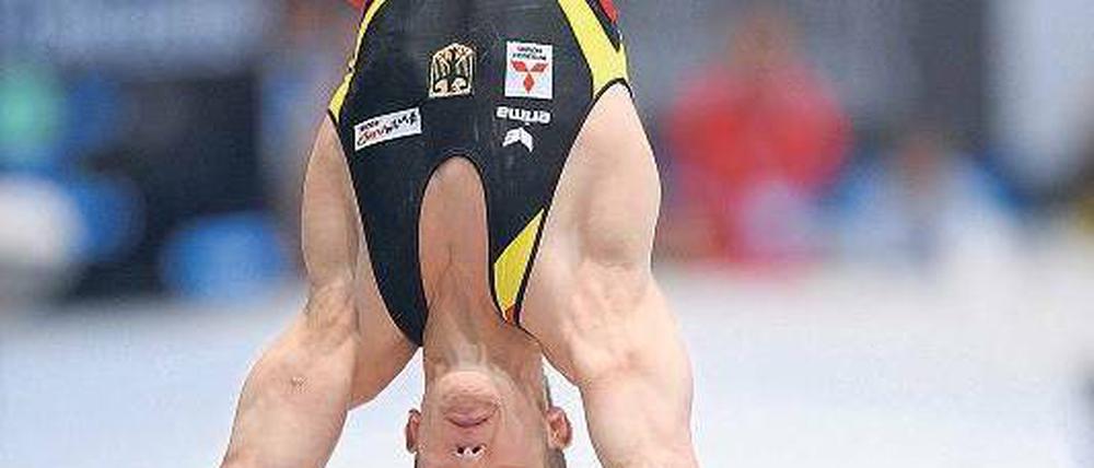 Breit aufgesetzt. Hambüchen überzeugte nicht nur am Reck. Foto: AFP