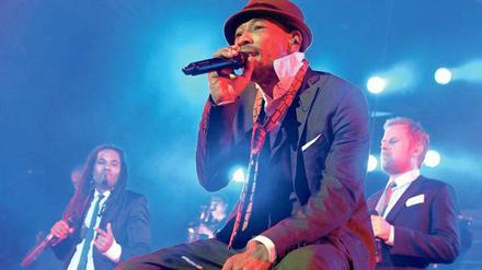 Die Seeed-Sänger Frank Dellé, Demba Nabé, Pierre Baigorry