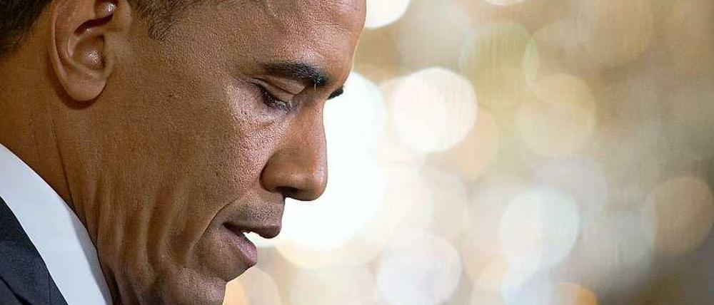 Nicht amüsiert. Die Geheimdienstaffäre trifft Barack Obama.