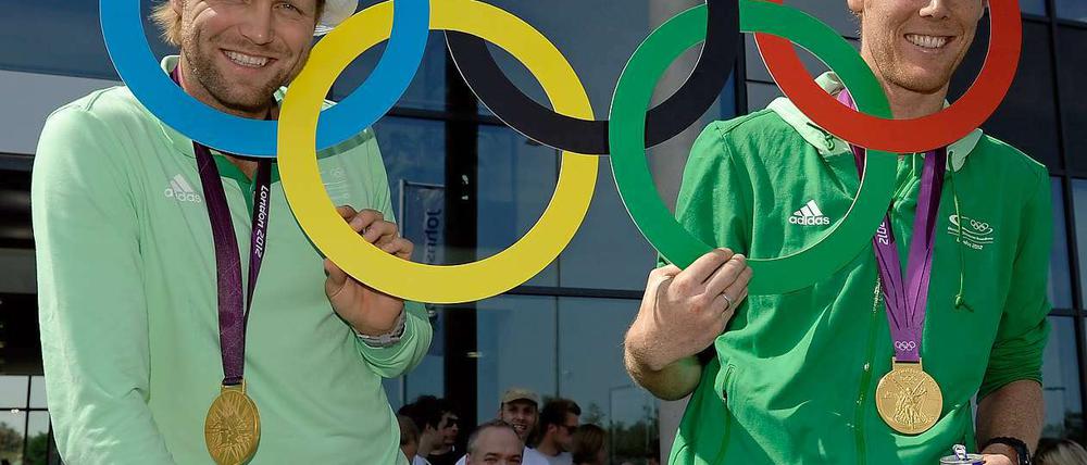 Im Kreise der Großen. Julius Brink und Jonas Reckermann (rechts) nach ihrem Olympiasieg in London.
