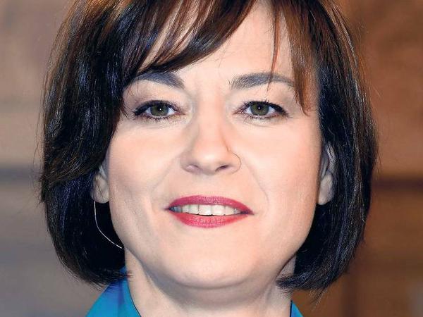 ZDF-Moderatorin Maybrit Illner befragt Merkel und Steinbrück beim TV-Duell. 
