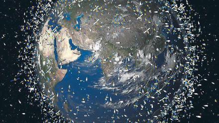Schrott am Himmel. Die Animation zeigt die größten Trümmer sowie aktive Satelliten im erdnahen Raum. Forscher arbeiten an Techniken, mit denen alte Satelliten eingefangen und entsorgt werden sollen. 