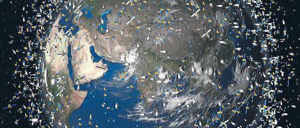 Schrott am Himmel. Die Animation zeigt die größten Trümmer sowie aktive Satelliten im erdnahen Raum. Forscher arbeiten an Techniken, mit denen alte Satelliten eingefangen und entsorgt werden sollen.