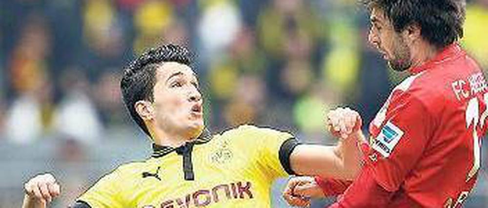 Auf Augenhöhe? Nuri Sahin und der BVB hatten Probleme mit dem FC Augsburg.Foto: dpa