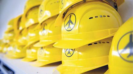 Helm ab, Helm auf. Am BER sind kaum noch Bauarbeiter zu sehen, dafür dürften sich bald viele auf den Weg nach Tegel machen.