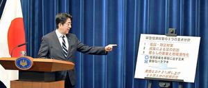 Das ist der Weg aus der Rezession, behauptet Japans neuer Premier Shinzo Abe über sein milliardenschweres Konjunkturprogramm 