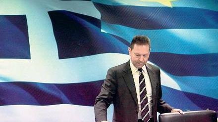 Unter Druck. Auch wenn der Schulden-Rückkauf erfolgreich anlief, muss Finanzminister Yannis Stournaras weiter mit den anderen Regierungsparteien um die Steuerreform ringen. 