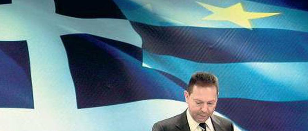 Unter Druck. Auch wenn der Schulden-Rückkauf erfolgreich anlief, muss Finanzminister Yannis Stournaras weiter mit den anderen Regierungsparteien um die Steuerreform ringen. 