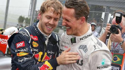 Ende einer Ära! Beginn einer Ära?! Beim letzten Rennen von Rekordchampion Michael Schumacher (r.) steigt Sebastian Vettel (l.) mit seinem dritten WM-Titel in die Ruhmeshalle der ganz großen Formel-1-Fahrer auf.