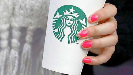 Die Aktivisten von "UK Uncut" wollen Starbucks-Filialen in Kinderkrippen und Obdachlosenheime verwandeln.