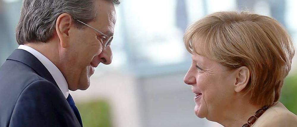 Antonis Samaras, griechischer Premierminister und Bundeskanzlerin Angela Merkel treffen sich am Dienstag um über die Zukunft des krisengeschüttelten Mittelmeerstaates zu beraten.