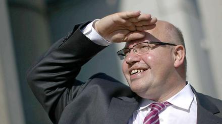 Bundesumweltminister Peter Altmaier (CDU) während seiner Sommerreise.