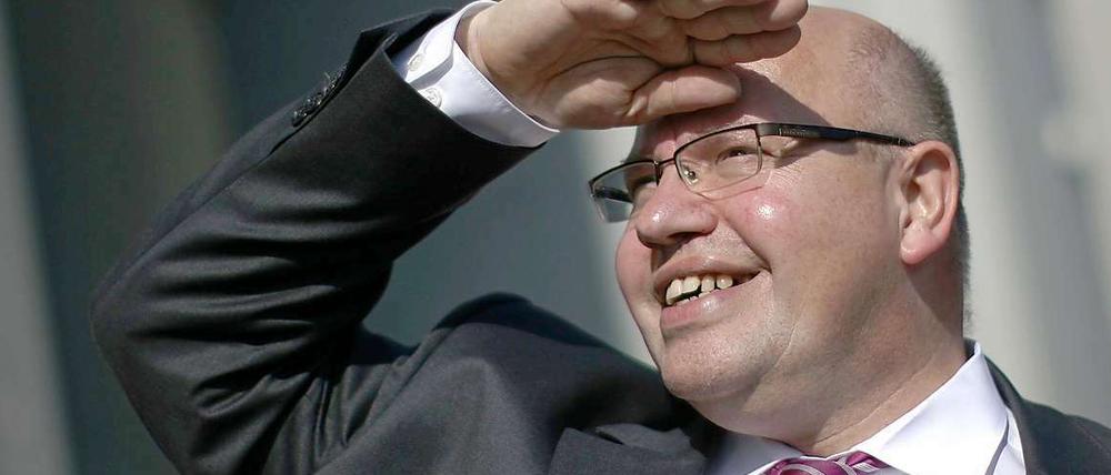 Bundesumweltminister Peter Altmaier (CDU) während seiner Sommerreise.