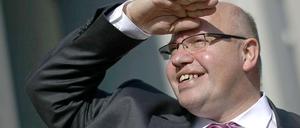 Bundesumweltminister Peter Altmaier (CDU) während seiner Sommerreise.