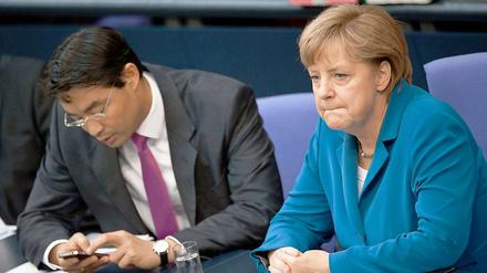 Bundeswirtschaftsminister Philipp Rösler (FDP) und Bundeskanzlerin Angela Merkel (CDU)