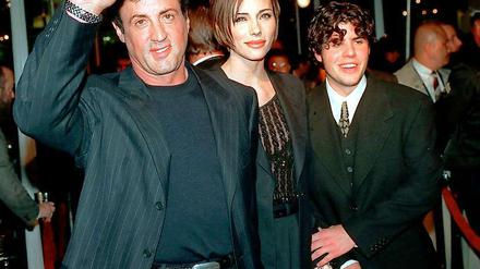 Sylvester Stallone mit seiner damaligen Freundin und heutigen Ehefrau Jennifer Flavin und Sohn Sage im Dezember 1996.