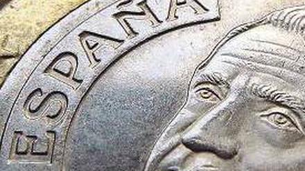 Harte Währung? Die Staatsschuldenkrise in Spanien spitzt sich weiter zu – die Sorge vor einem Auseinanderbrechen des Euro-Währungsraums wächst. Foto: dpa