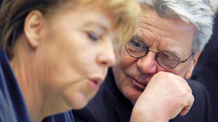 Bundeskanzlerin Angela Merkel (CDU) und der Bundespräsident Joachim Gauck. 
