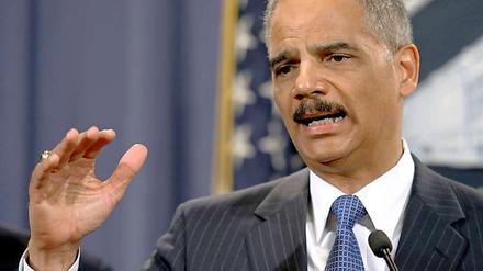 US-Justizminister Holder lobte die Abmachung als "Modell für Fairness"