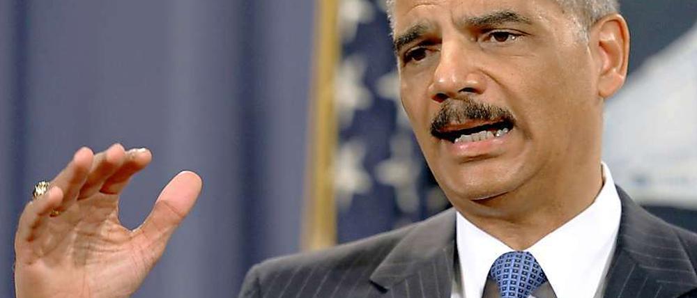 US-Justizminister Holder lobte die Abmachung als "Modell für Fairness"