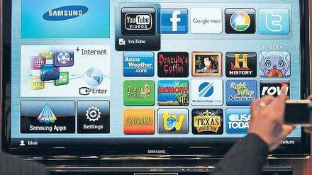 App-solut begrenzt. Smart-TVs erlauben den Zugriff aufs Netz, aber nur über das begrenzte Angebot an Apps. Netz-Videotheken und Mediatheken bleiben außen vor.Foto: dapd