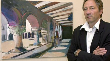 Rudi Kargus im Rathaus seiner Heimatstadt Worms zu Beginn einer Vernissage vor dem Ölgemälde "Andreasstift Ansicht 1". 