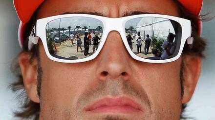 Der Spanier Fernando Alonso ganz souverän mit Durchblick: Er gewann überraschend das Rennen in Malaysia. 