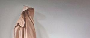 Im Mantel fängt sich das Licht der Sonne