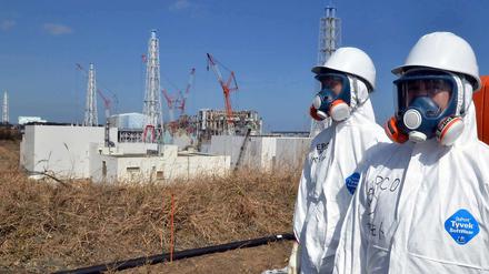 Japanische Arbeiter am havarierten Atomkraftwerk Fukushima.